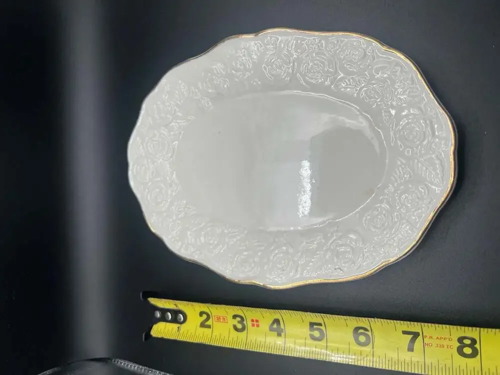 White Porcelain Oval Serving Platter with Embossed Rose Motif and Gold Trim